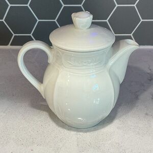 White porcelain Lidded Creamerwith Decorative Relief